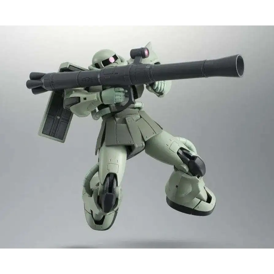 Olivgrön och grå plastmodell av Gundam Zaku II med svart gevär