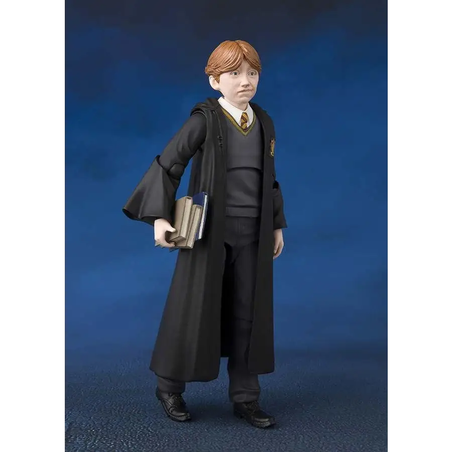 Svart Hogwarts-elev actionfigur som Ron Weasley med röda-bruna håret, detaljerade kläder och böcker
