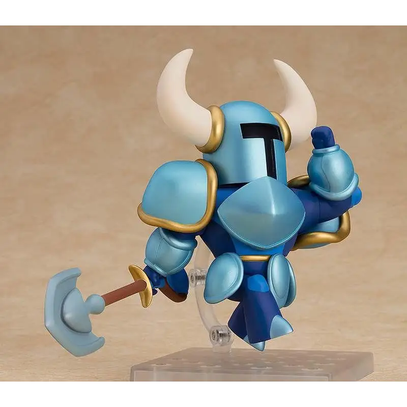 Blå och gul riddarfigur i rustning med vita horn, håller hammare – Shovel Knight Nendoroid