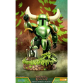 Grön och guld Shovel Knight-statue med vita horn på grässtenbas