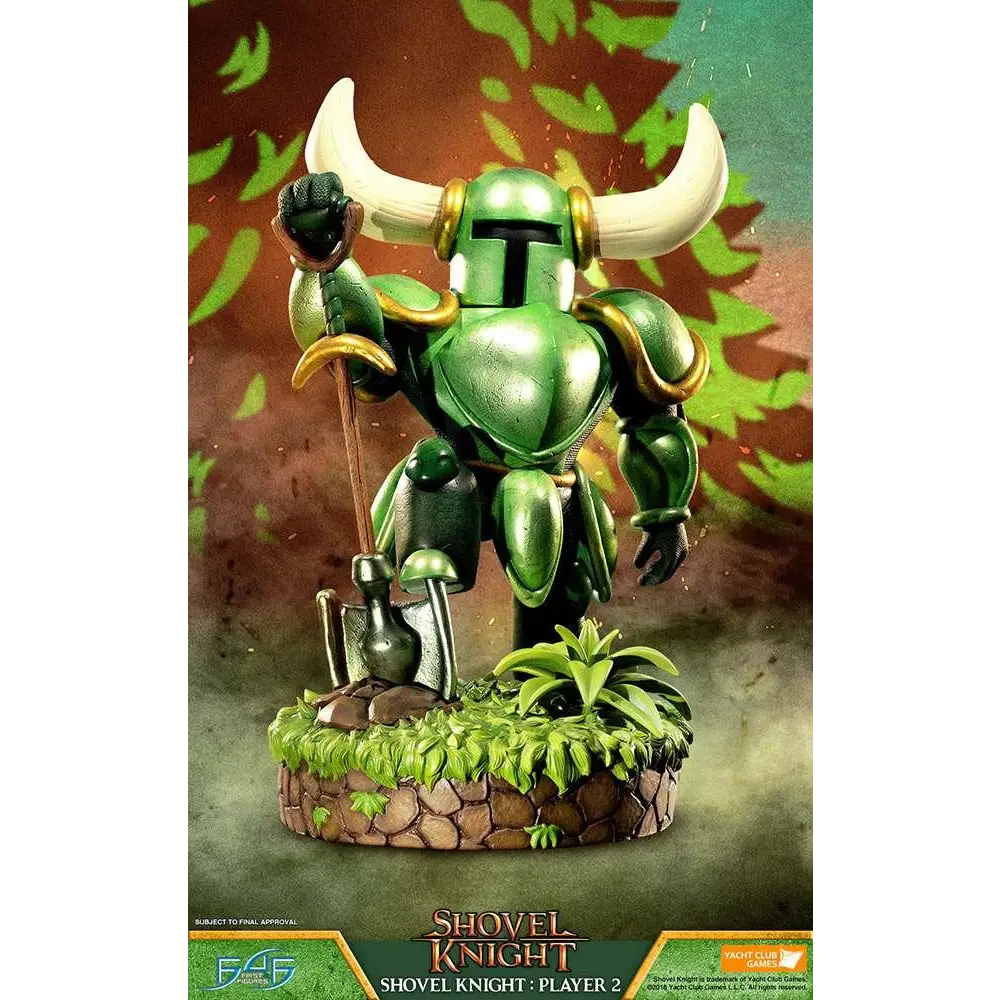 Grön och gul Shovel Knight-staty med vita horn på grässtenbas