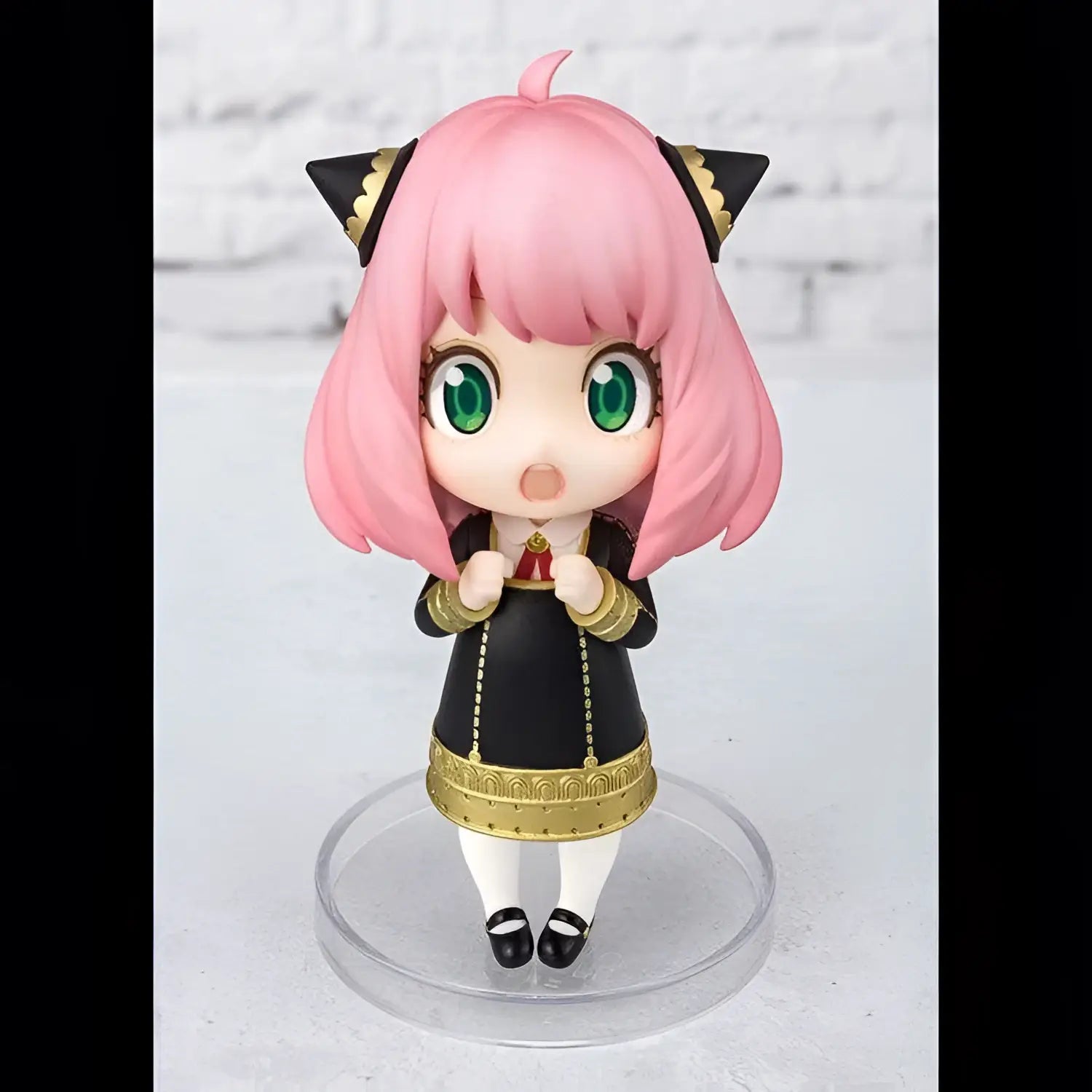Rosa chibi-figur av Anya Forger från Spy x Family, rosa hår, gröna ögon