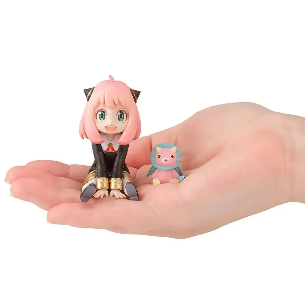 Rosa hårupp animeflicka-figur med svarta kattöron i Spy x Family Anya Palm Size GEM-statyn