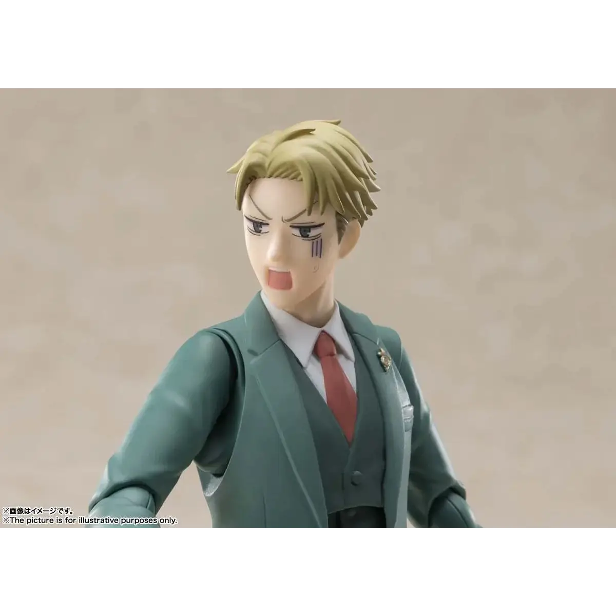 Loid Forger S.H.Figuarts-figur med grön kostym, blond hår och röd slips