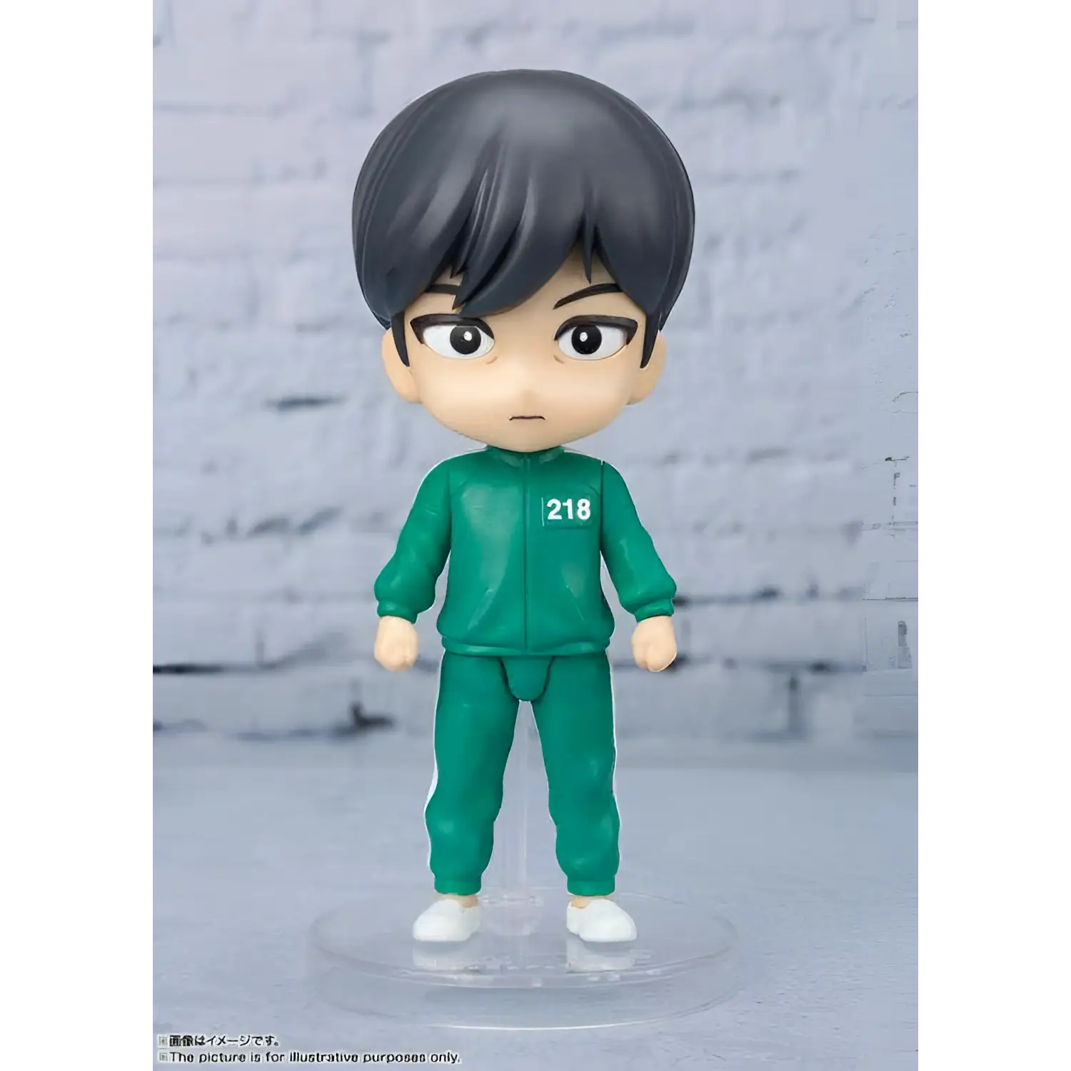 Grön figuarts mini-figur av Cho Sang-woo från Squid Game med svart hår och nummer 218