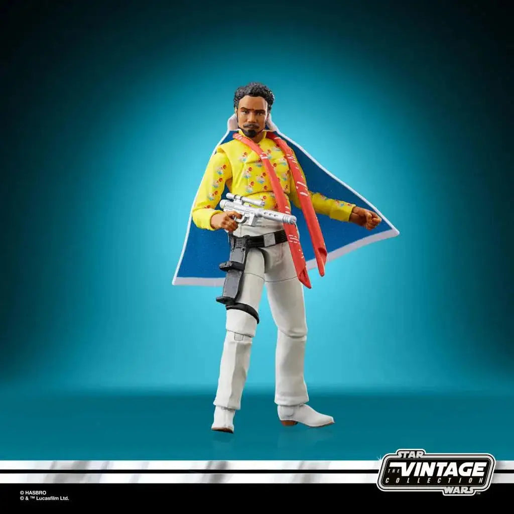 Lando Calrissian actionfigur från Star Wars Battlefront II i gul skjorta, vita byxor och blå mantel
