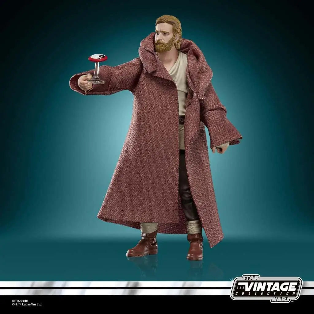 Detaljerad Obi-Wan Kenobi actionfigur i rödbrun mantel och beige kläder med röd-vit lightsaberhantel