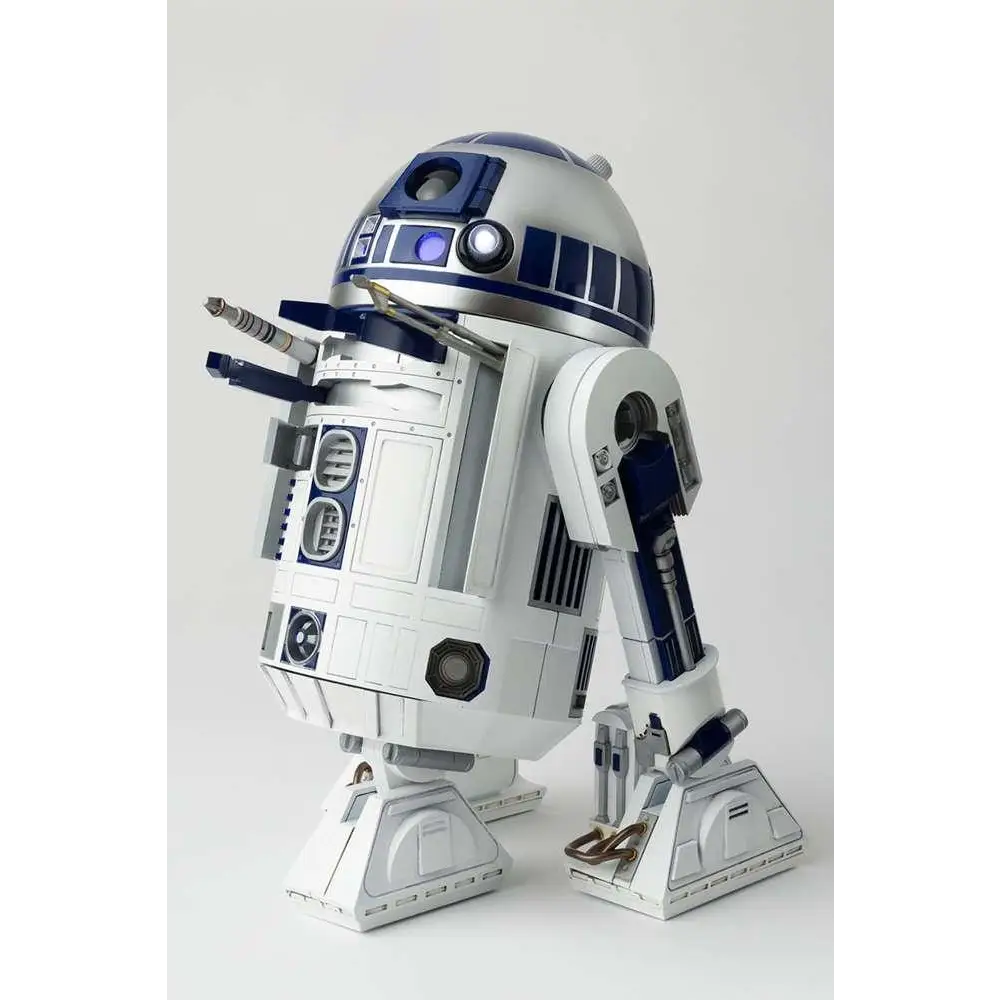 Vit R2-D2 Chogokin diecastfigur med blå-vita paneler och sensorljus