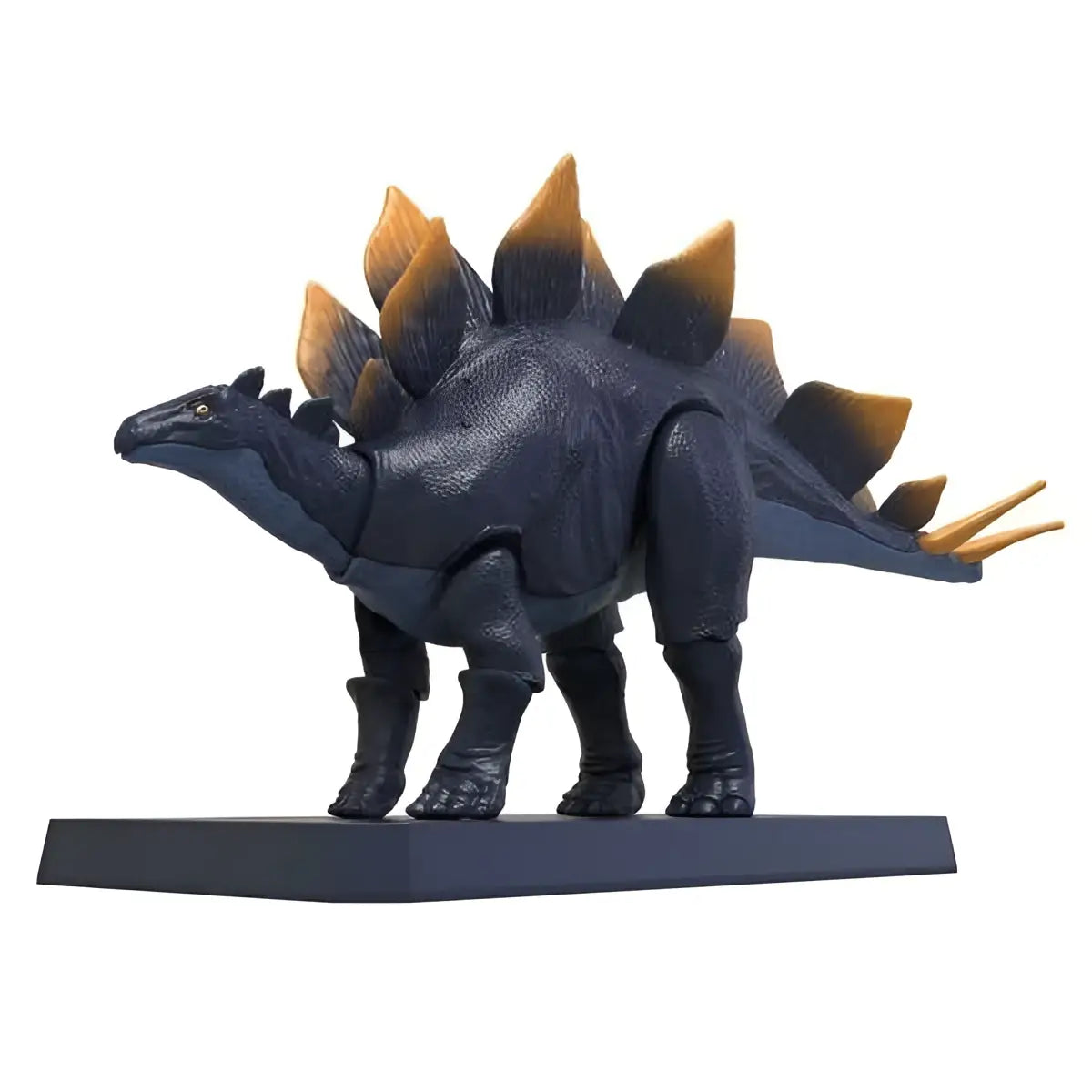 Mörkblå plast Stegosaurus-figur med guldfärgade taggplattor på ryggen