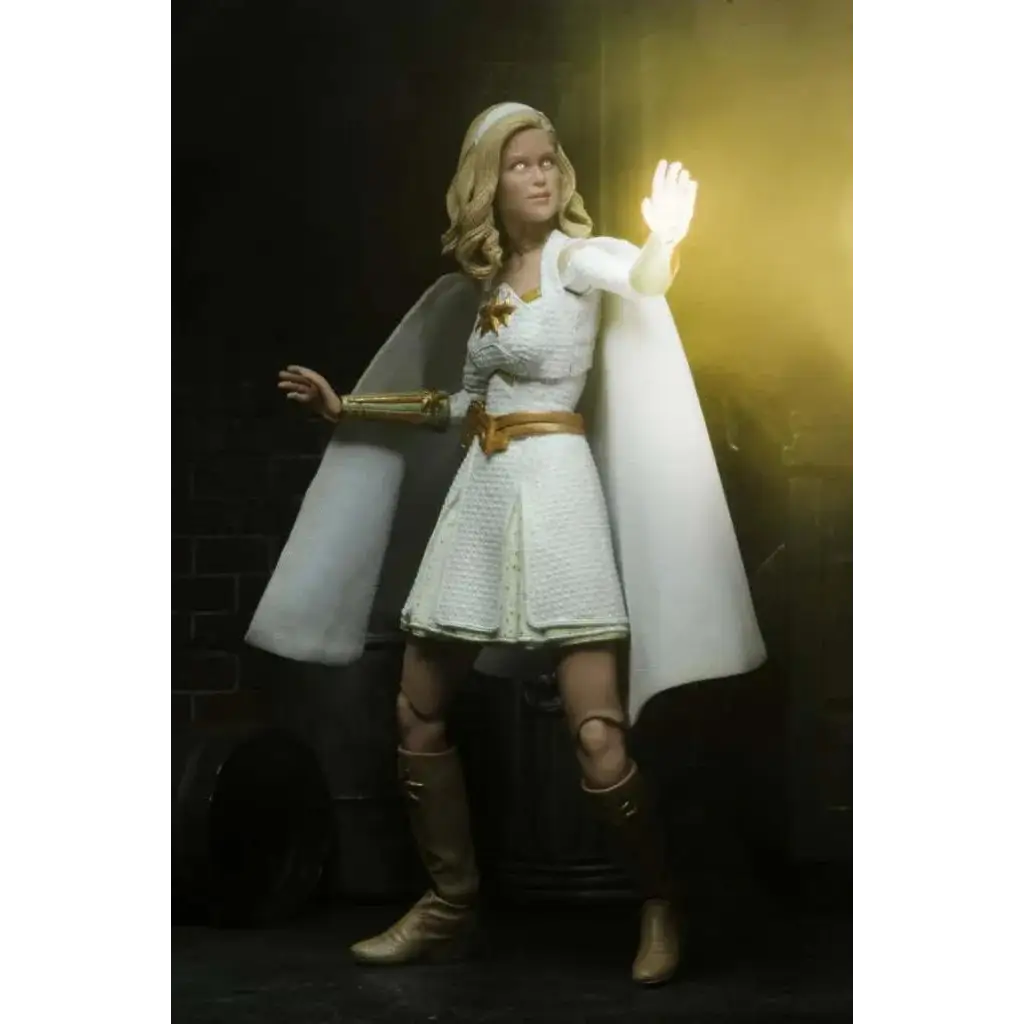 Vit Starlight actionfigur 7 tum med vit texturerad klänning, guldrem och cape med stjärnemblem