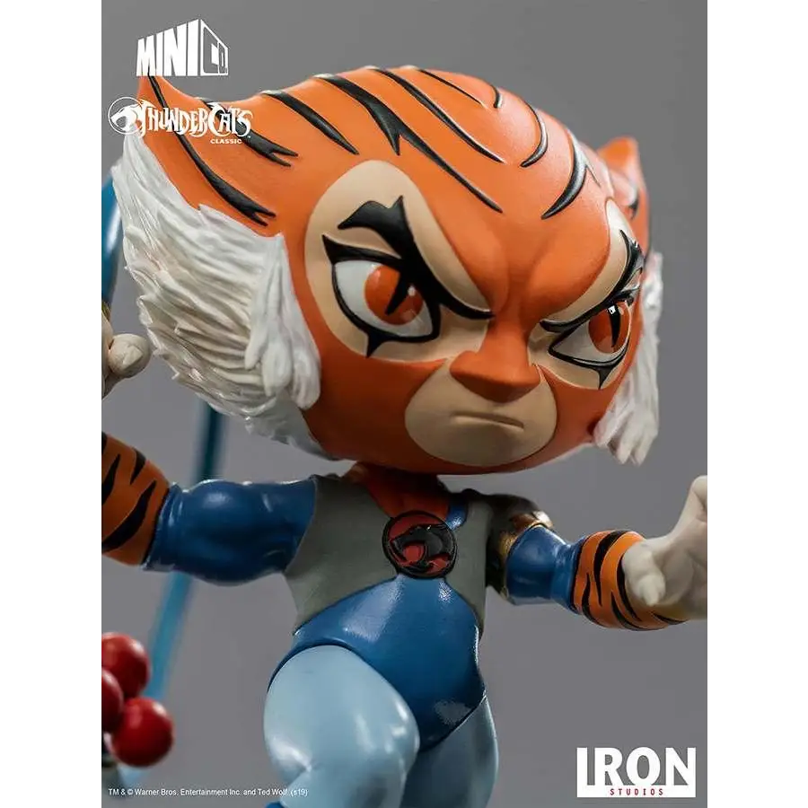 Klassisk Tygra Thundercats-figur i orange och blått med vit man och emblem