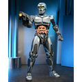 Silver and gray TMNT Utrom robot exoskeleton action figure with glowing yellow eyes, holding a gun, and orange alien protruding from chest