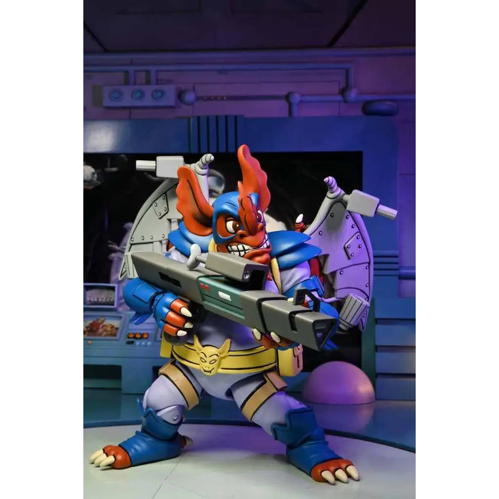 Blå och orange rustad figur med röda flammliknande öron och stor grå vapen i TMNT Wingnut och Screwloose 2-pack