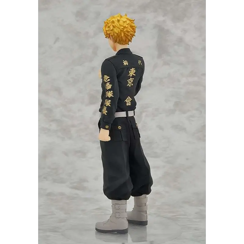 Takemichi Hanagaki figur med svart figur, spikig guldhår och uniform med guldiga japanska tecken