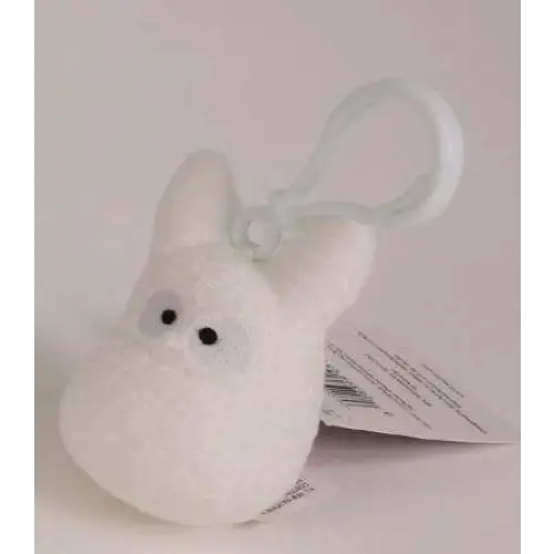 Vit Mumin nyckelring med svarta knappliknande ögon och transparent plastclip