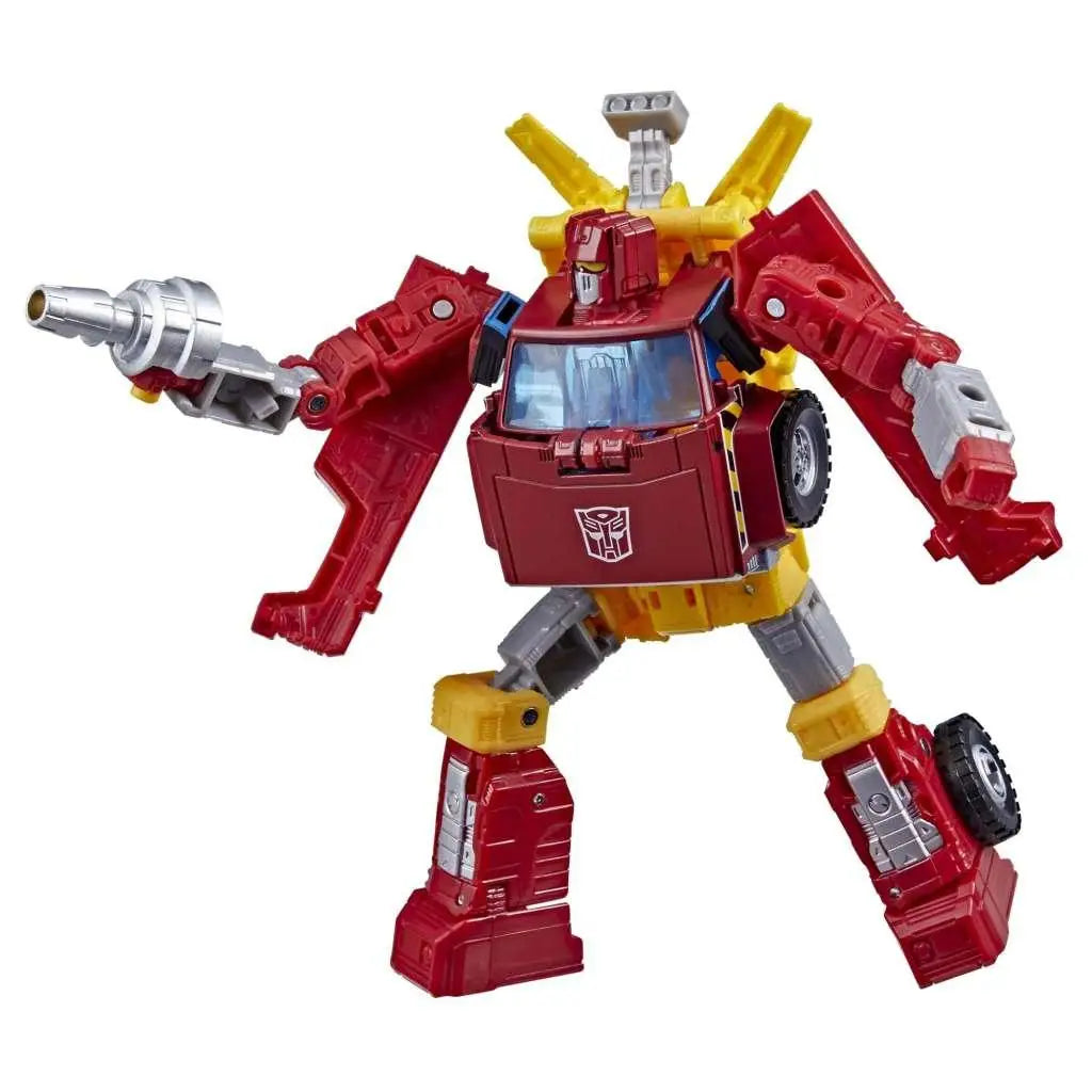 Röd och gul Transformers Legacy Lift-Ticket robot med silverdetaljer, lastbilslik design, svarta däck och Autobot-logo
