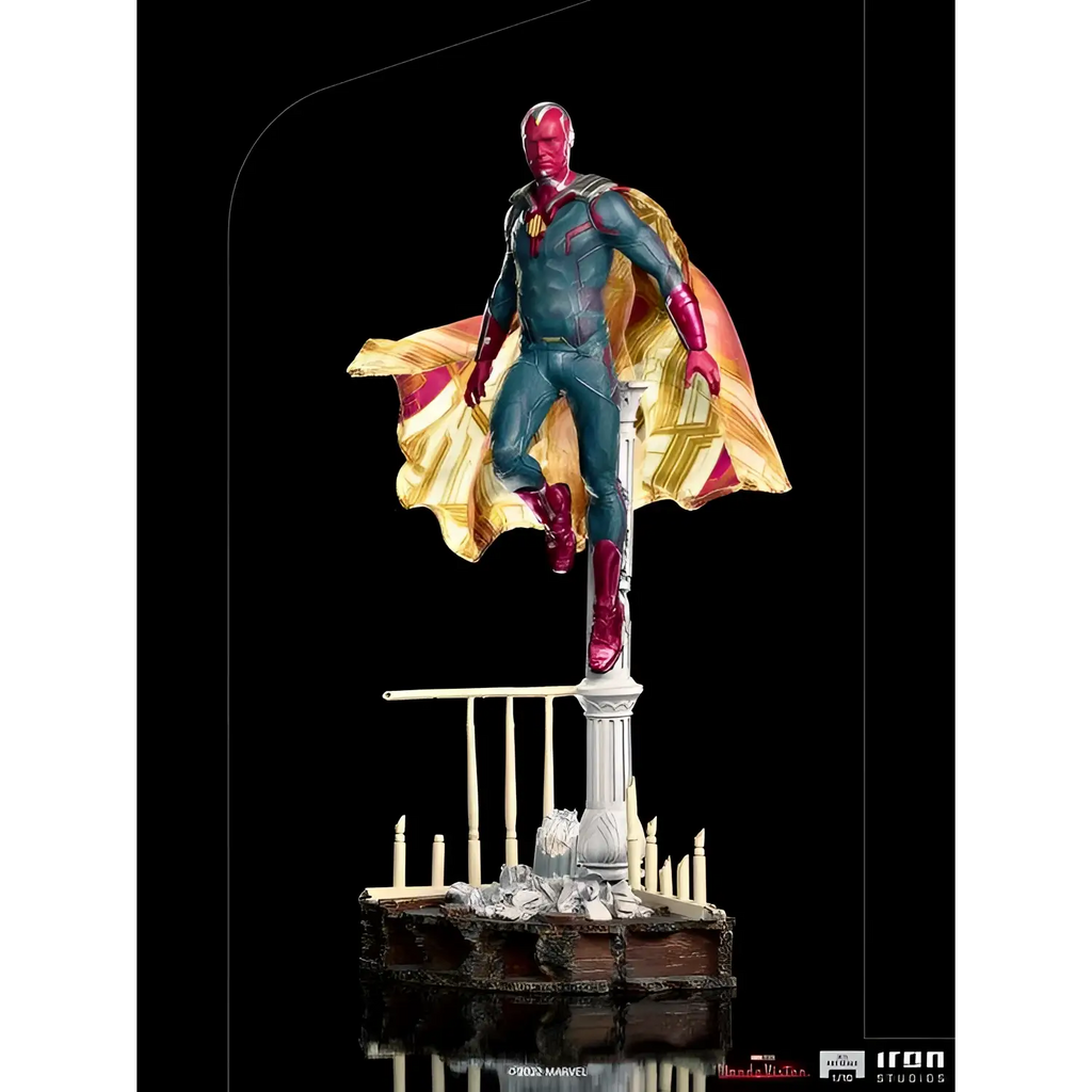 Wandavision Vision 1/10-statyn med rött ansikte, turkos kostym i guld och magenta, på vit sockel