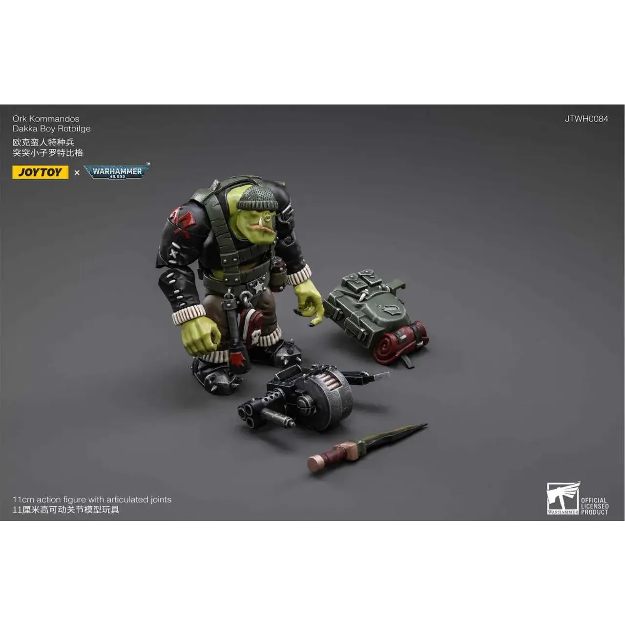 Grönskinn ork kommando Dakka Boy Rotbilge 1/18 figur i svart och grön rustning