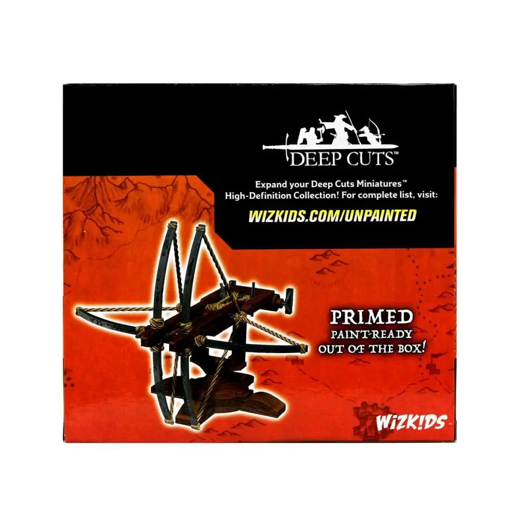Svart och brun primerad ballista miniatyr från Wizkids, redo för målning